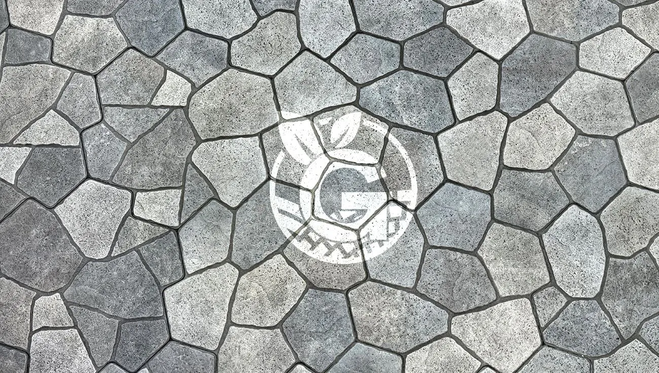 Green Flowers Landscaping logo etched on stone